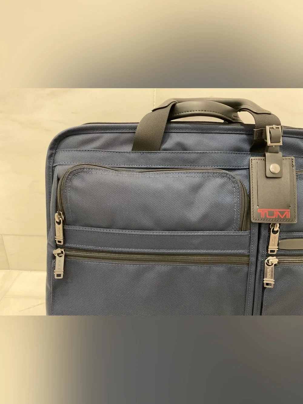 Tumi up sale